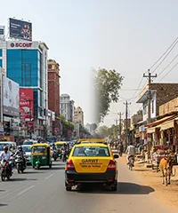 View of Jaipur city fading into rural roads toward Jhunjhunu