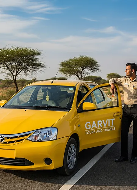 Yellow taxi cab from Garvit Tours and Travels parked during Jhunjhunu to Jaipur ride