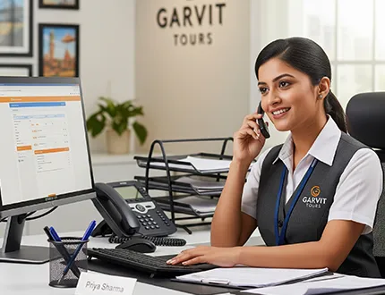 Garvit Tours customer-support representative at desk